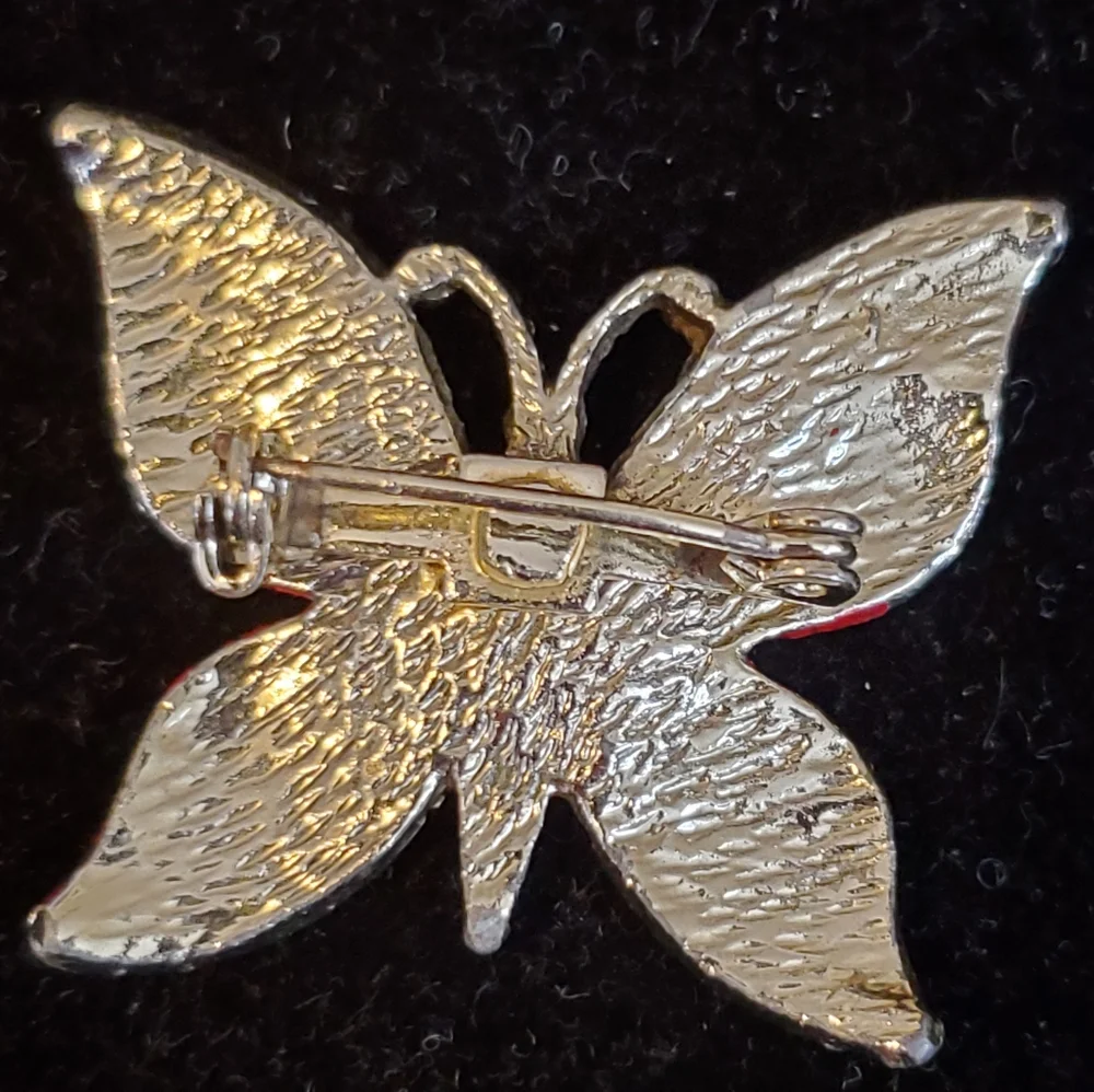 Goldtone and red butterfly pin Damaged